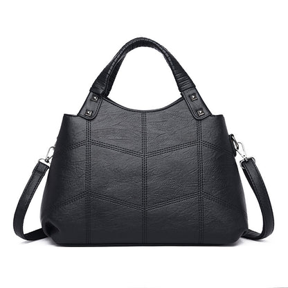 Leather handle shoulder bag