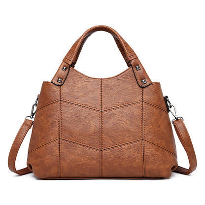 Leather handle shoulder bag